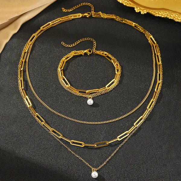 Parure dorée perle